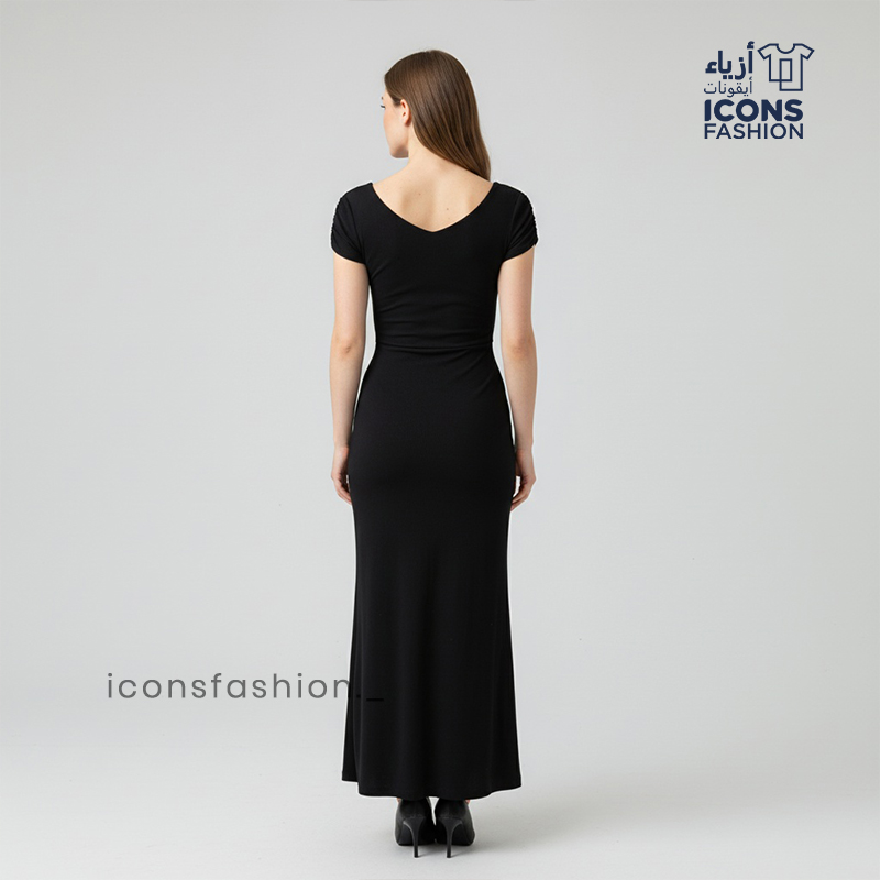 Black-bodycon-party-wear-dress-for-women-with-V-neckline-short-puff-sleeves-sheer-mesh-waist-panel-and-asymmetric-ruffle-hem