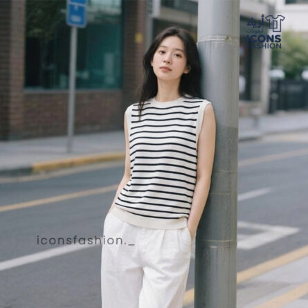Women-wearing-black-and-white-striped-sleeveless-shirt-with-round-neck