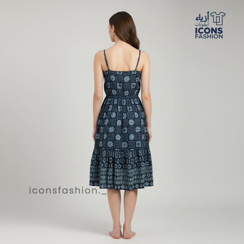 Woman-navy-blue-printed-sleeveless-fit-and-flare-midi-dress-with-scoop-neck-and-flared-hem