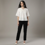 Women-off-white-embroidered-top-with-round-notch-neckline-elbow-length-flared-sleeves-with-fringe-trim-relaxed-fit-and-hip-length-straight-hem