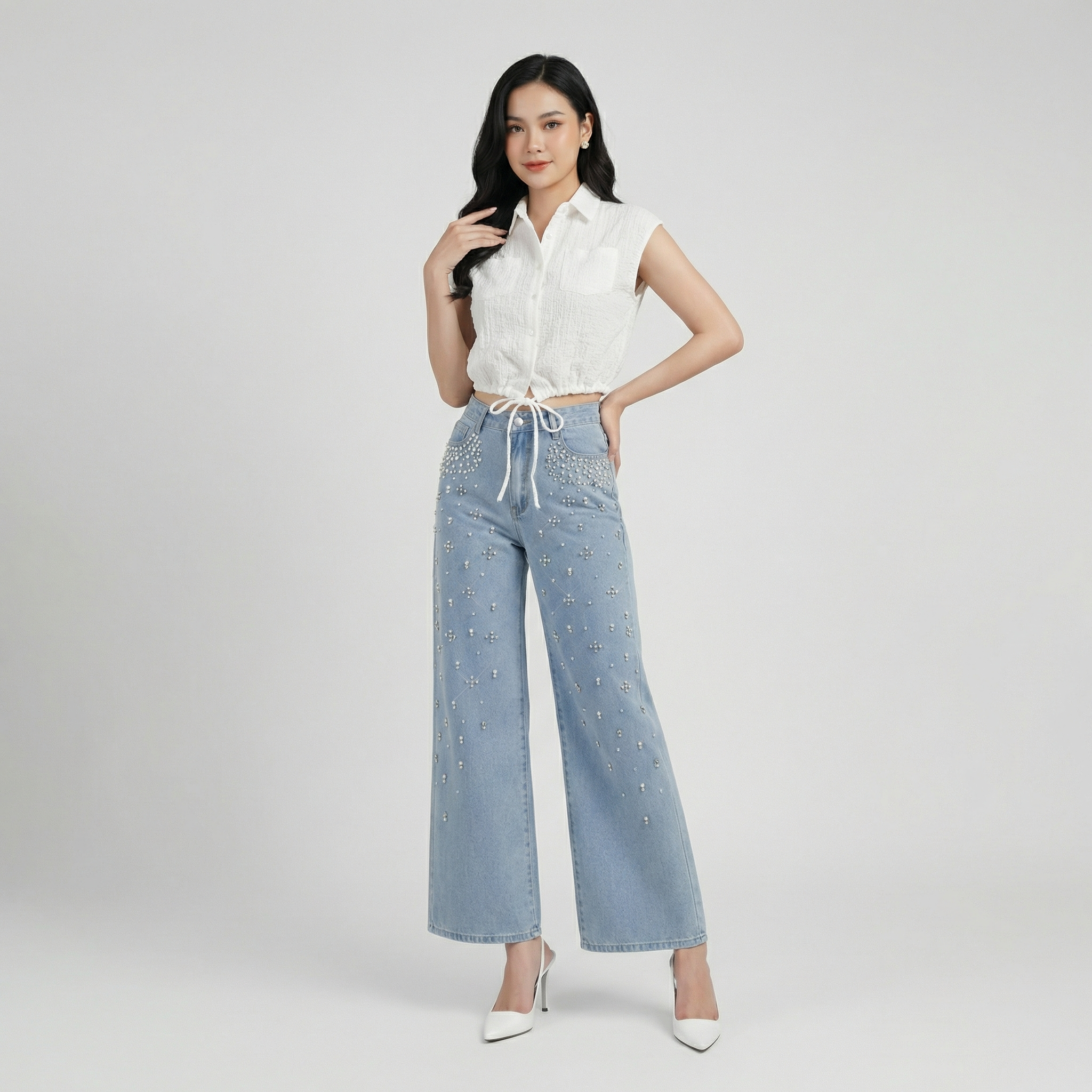 White-sleeveless-collared-crop-top-with-front-buttons-and-adjustable-drawstring-hem