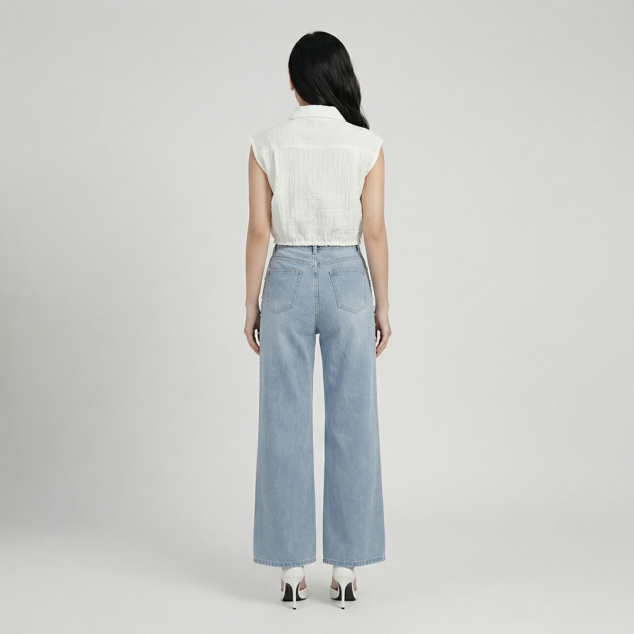 White-sleeveless-collared-crop-top-with-front-buttons-and-adjustable-drawstring-hem