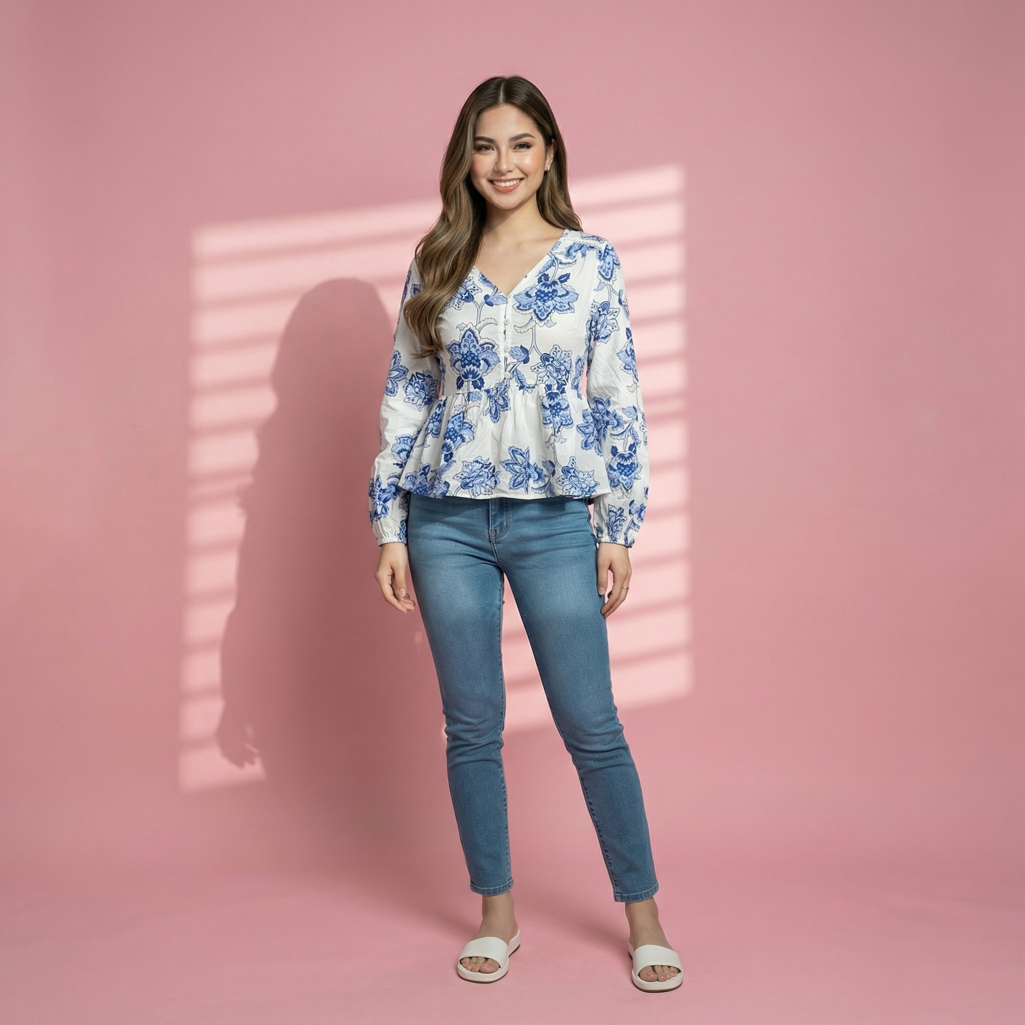 Blue-floral-print-V-neck-peplum-top-with-long-sleeves