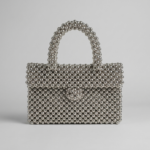 Silver-beaded-handbag-with-top-handle-and-flap-closure-structured-evening-bag