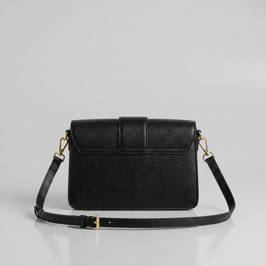 Black-structured-flap-shoulder-bag-with-gold-hardware-and-adjustable-crossbody-strap